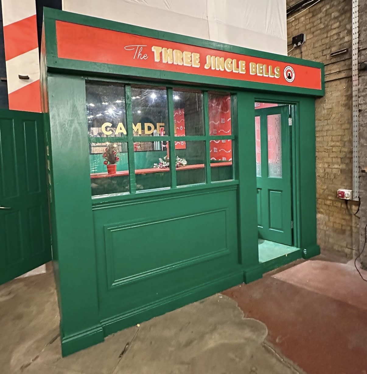 Hand-painted Three Jingle Bells festive pub frontage
