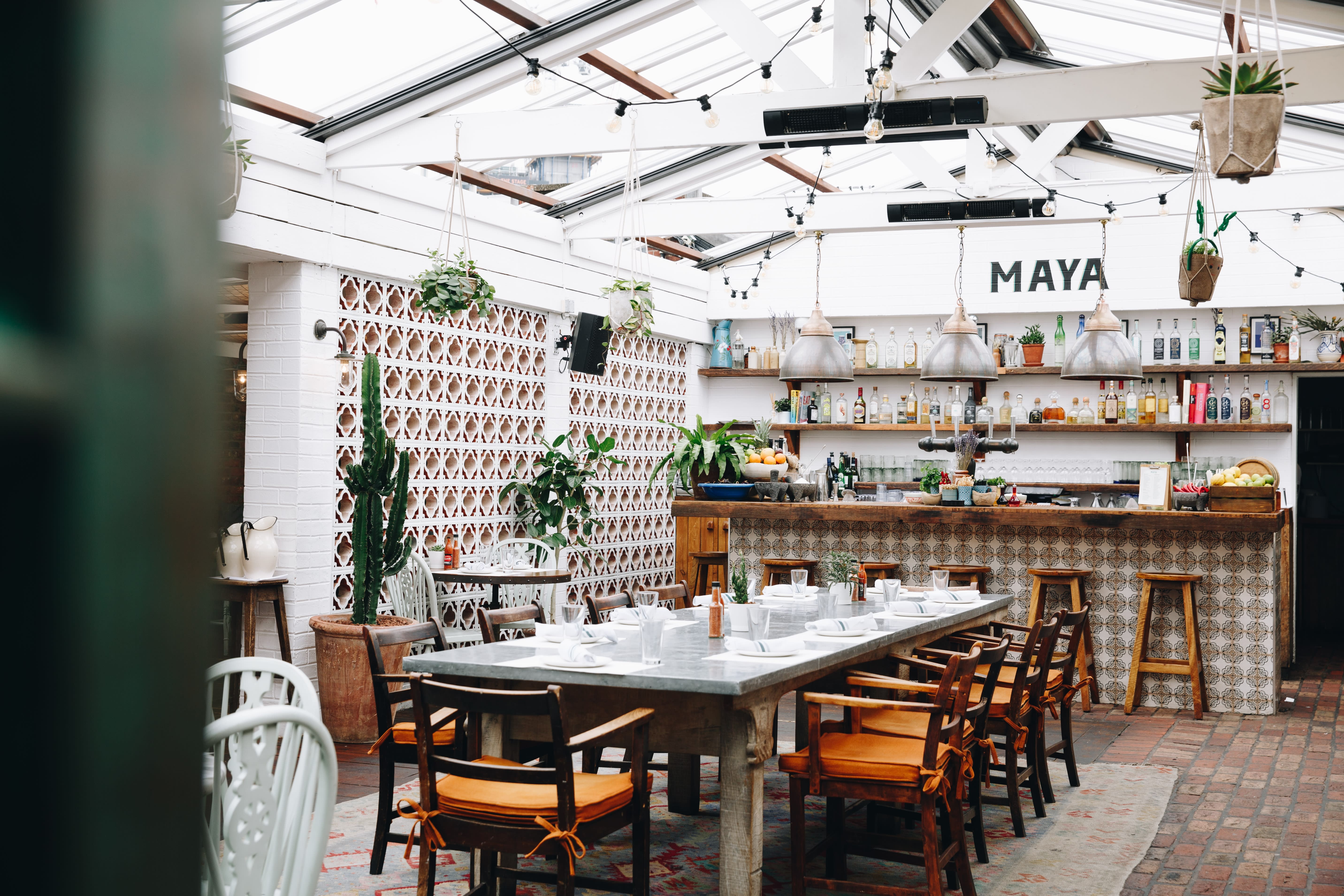 The MAYA bar at Soho House with its hand-painted sign above the counter.